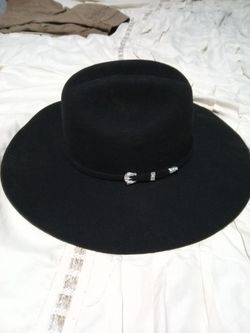 All black  stetion and cowboy hat