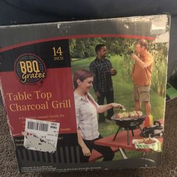 Table top charcoal grill. Is new