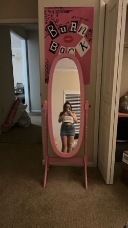 pink oval mirror