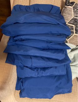 9 used royal blue table cloth