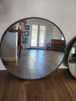 Round vanity mirrors.