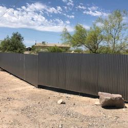 CORRUGATED METAL FENCE