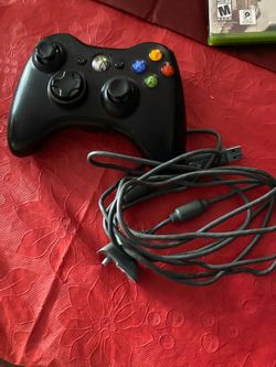 Xbox 360 With 6 Games and a Controller.