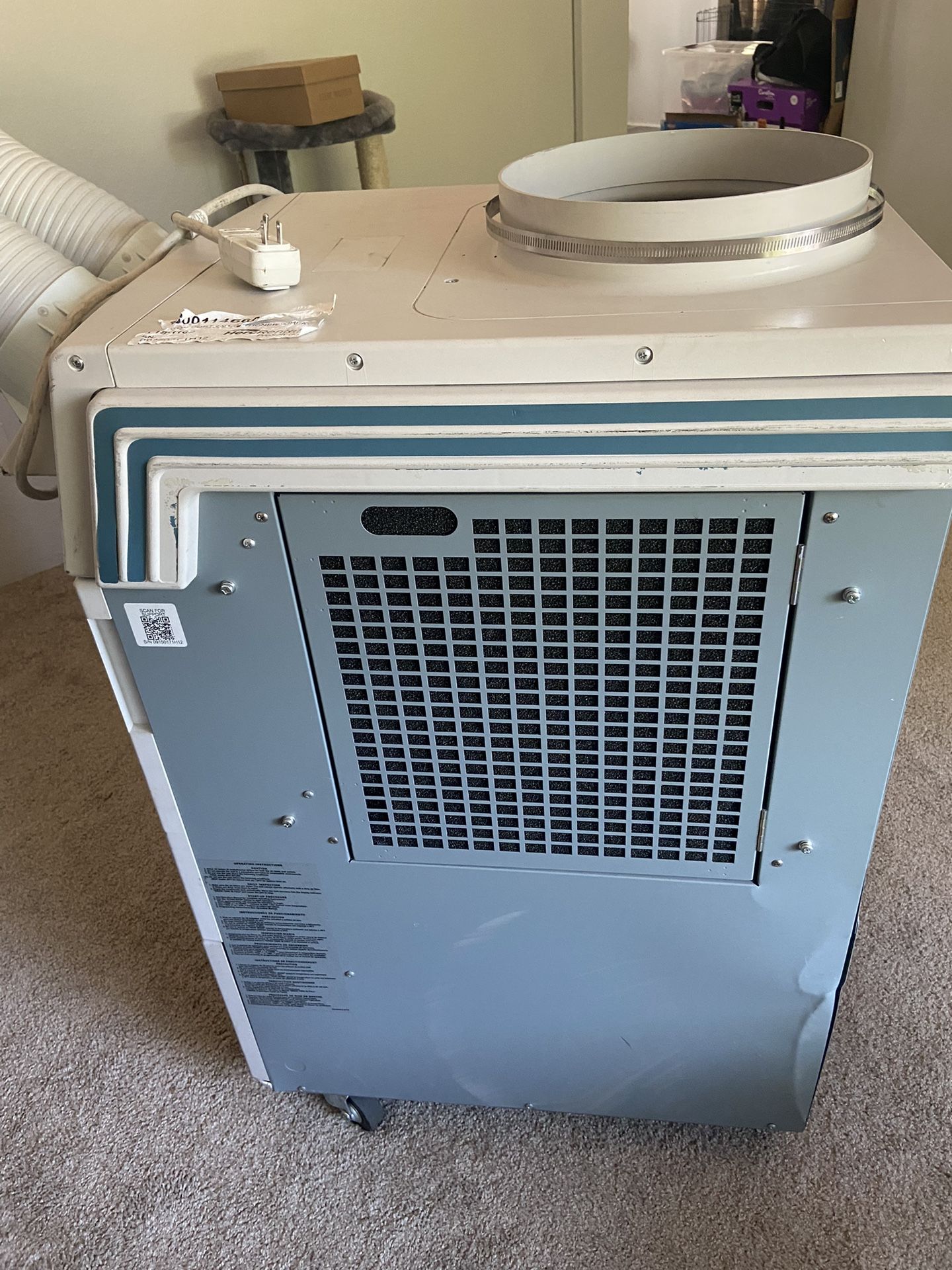 1 ton portable air conditioner/ heater. MOVINCOOL climate pro 12 for
