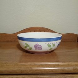 BRAND NEW LARGE GLASS BOWL WITH PRETTY LAVENDER FLOWERS AND GREEN LEAVES AROUND IT 