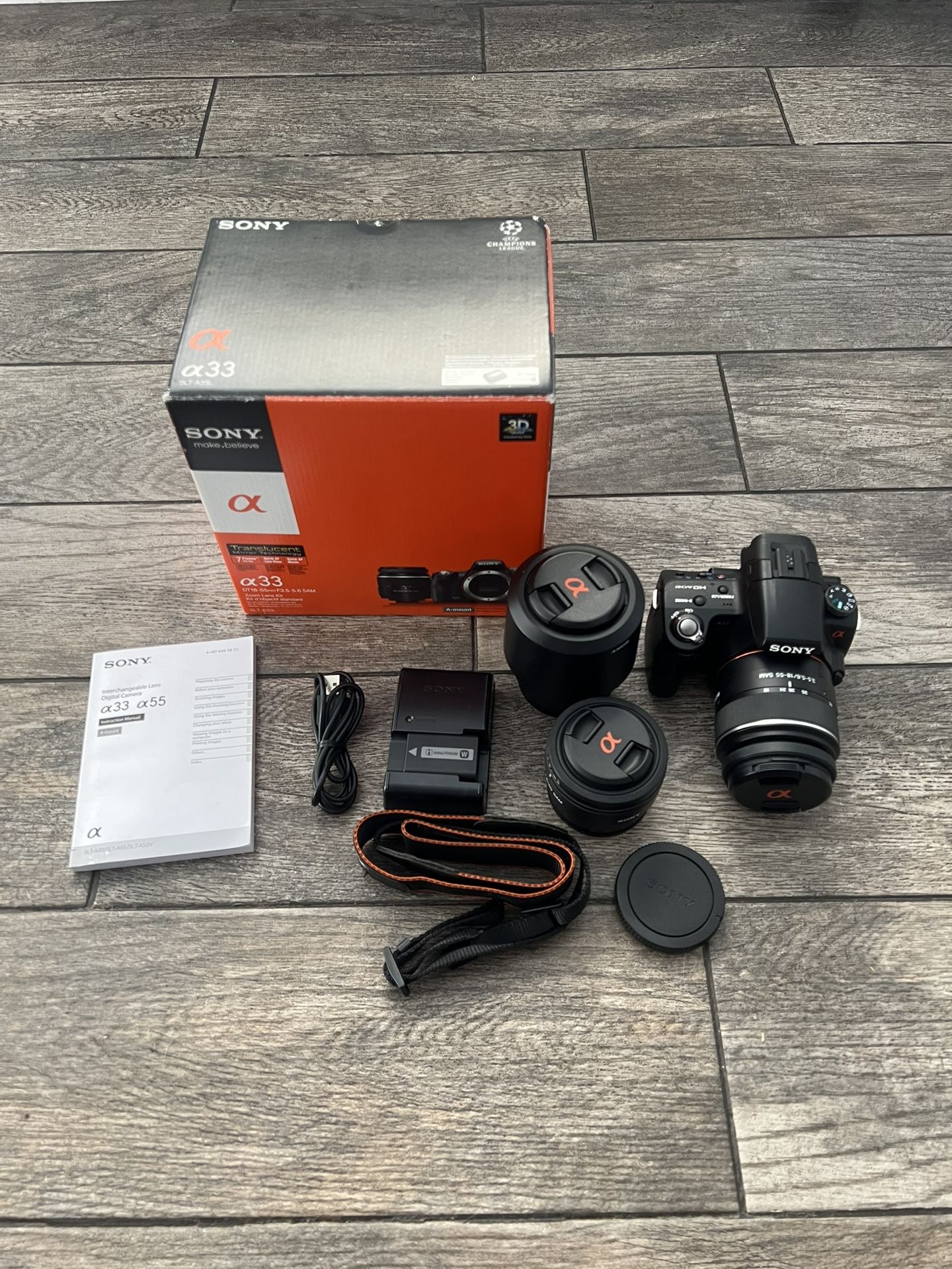 Sony SLT-A33 Camera Bundle With 3 Lenses, Two Batteries, Shoulder Strap