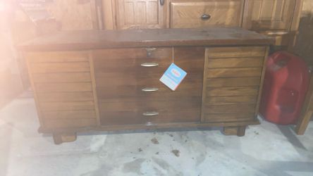 Cabinet the knobs are for decoration. You can use the inside for storage.