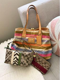 ZEBRA COACH AND RED WRISTLET