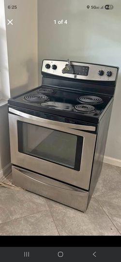 Black and Stainless Steel Stove working perfect