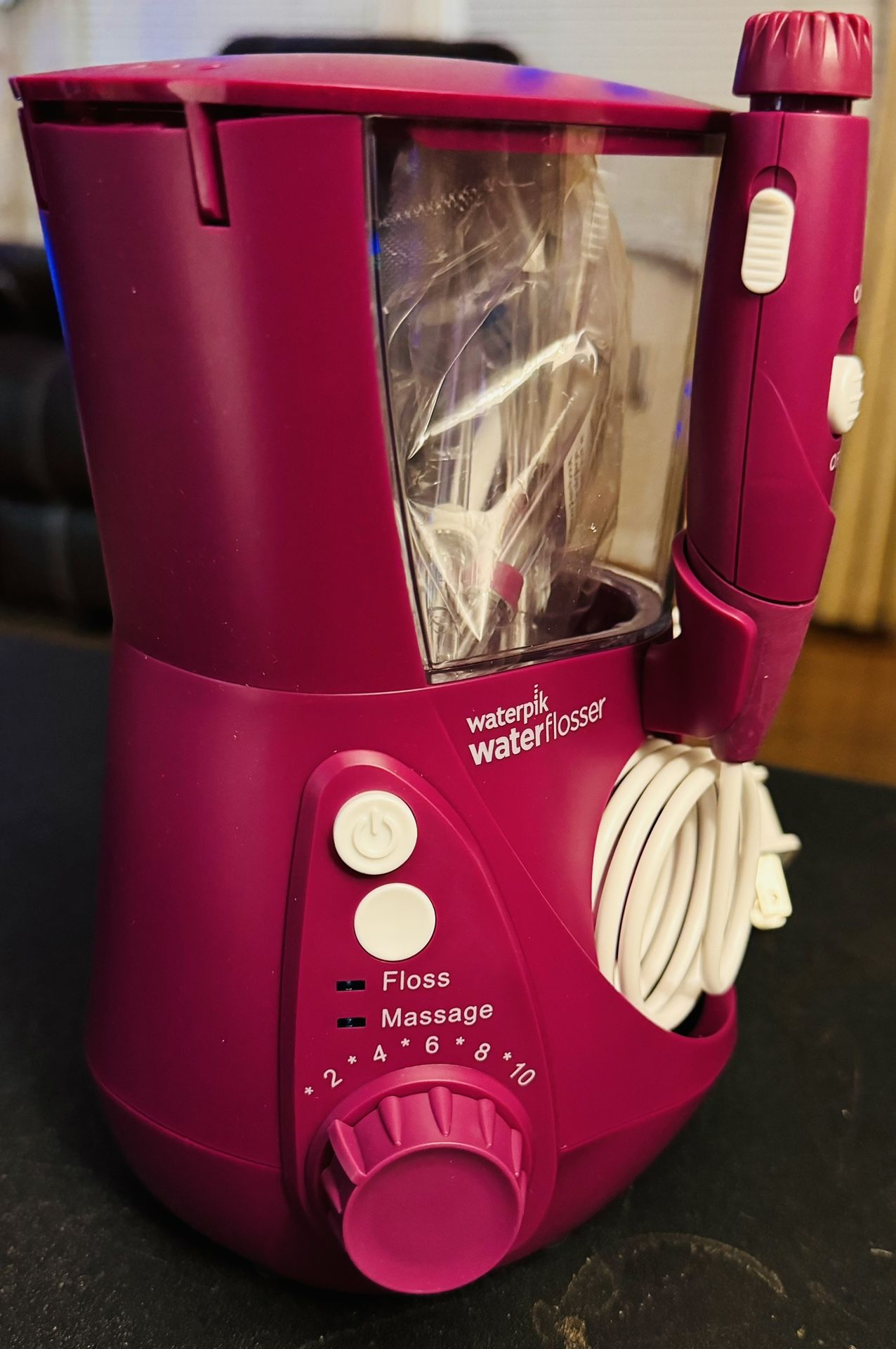 Brand New Open Box Waterpik water flosser -Purple