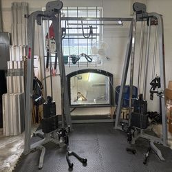 Cable cross workout station