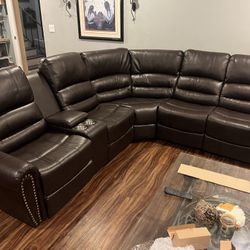 New Reclining Sectional.  Brown Or Black Leather.  111” X 99”.  Free Delivery!
