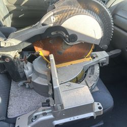 Dewalt DW 715 12” Compound Miter Saw.