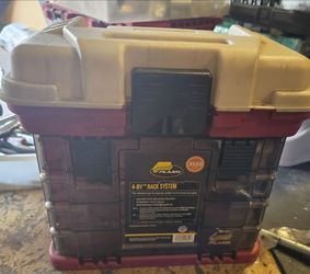 4 tier tackle box with assorted lures, weights, hooks, bait, etc.