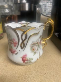 Antique mustache cup