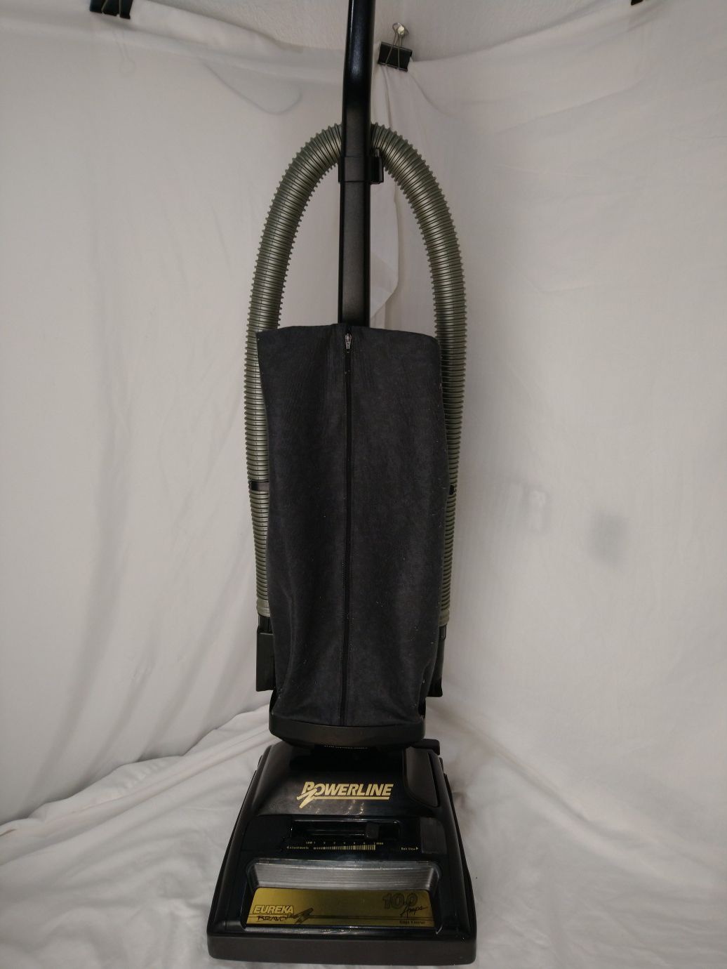 Black and silver Eureka POWERLINE upright vacuum