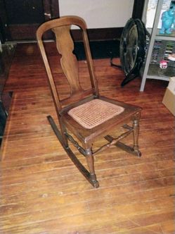 Antique Wood Rocking Chair with Cane Seat