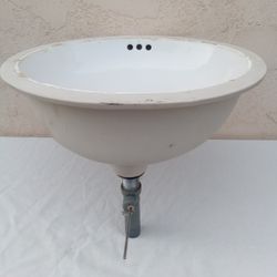 White Undermount Oval Bathroom Sink (19.25"x 16.5”) with Concealed Front Overflow
