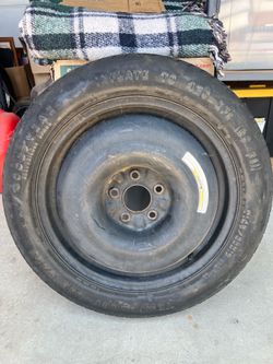 Spare tire (fits most 5 lug autos)