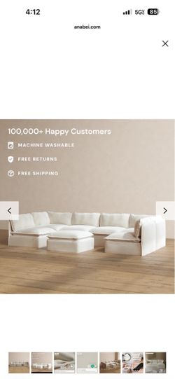 White sectional couch with ottoman