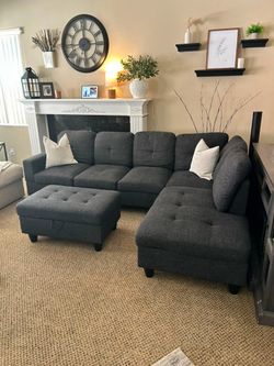 Beautiful dark grey sectional couch with storage ottoman