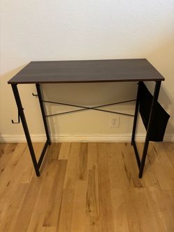 Brown office desk with side storage and 2 hooks, 16” x 32”