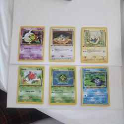 First Edition Pokémon cards from the 2001 Neo Discovery set. 