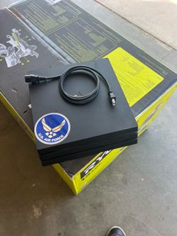 PS4 Pro (MITER SAW NIT FOR SALE ONLY USED IT TO PROP IT UP)