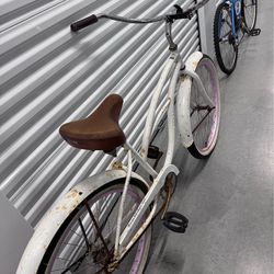 White and pink beach bike