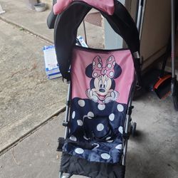 GENTLY USED MINNIE MOUSE FOLD UP STROLLER 