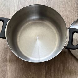 Stainless steel pot with small steel pan