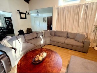 Sectional with storage underneath each seat.
