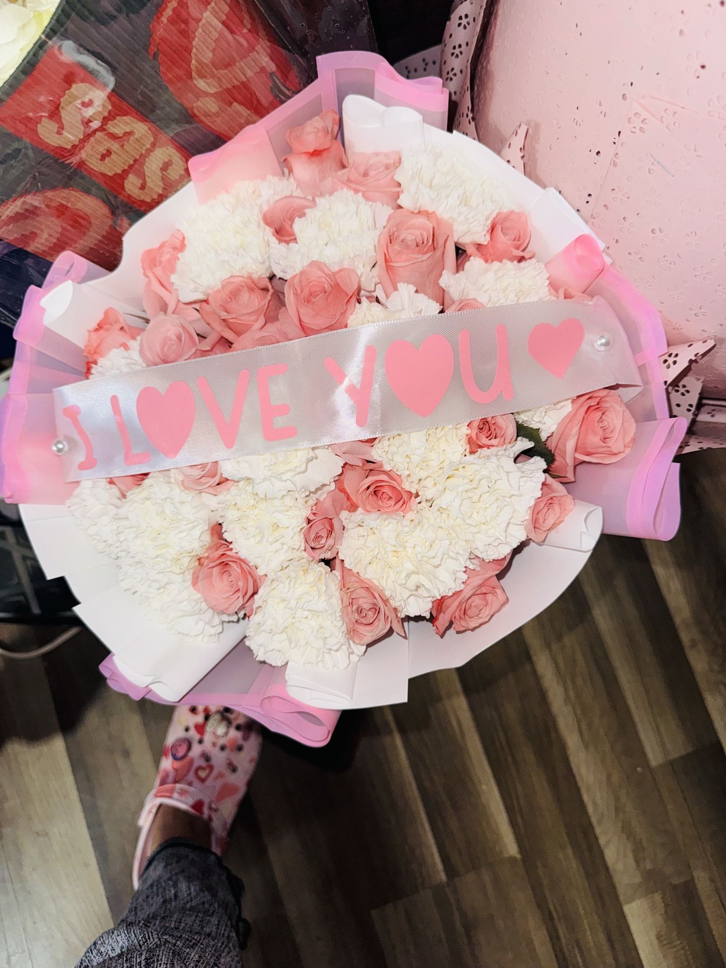 Pink roses and white carnations