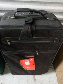 Suitcase. Medium Size With Wheels. 