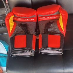 Boxing Bag And 2 Sets Of Gloves