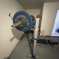 Adjustable  Bench Press And Olympic Weights 
