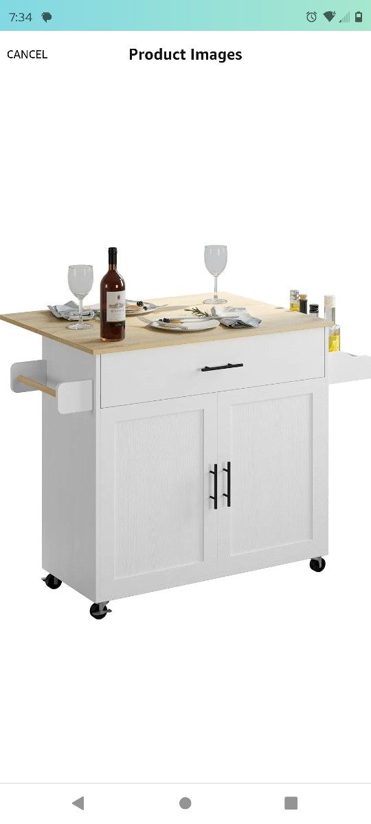 Kitchen Island It's minimally used ... They also removed side handles and drawer.. Price Reduced.. Sold As Is..