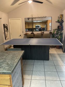 Brand new table tennis board on one side table top on other side