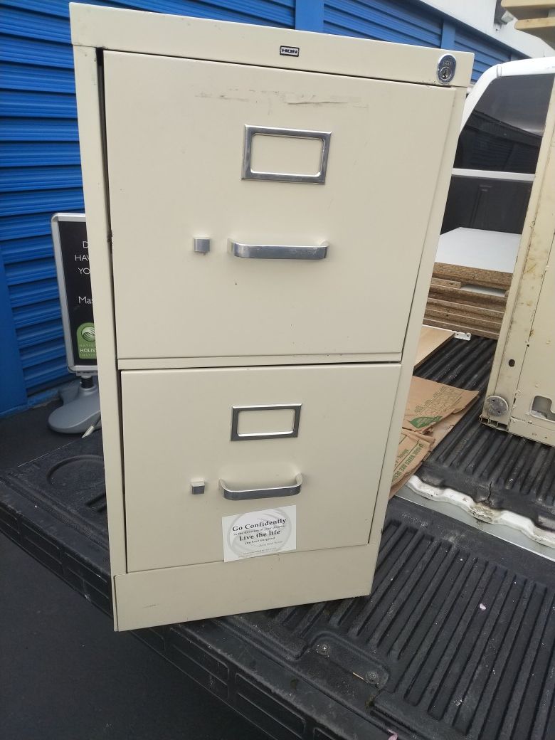 Office desks and filing cabinets and other office furniture super deal make me an offer .