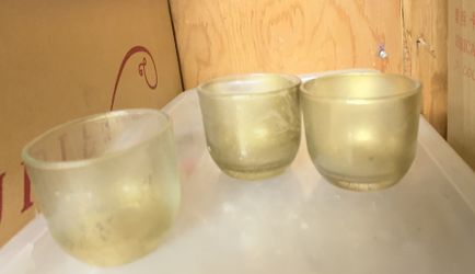 Gold, silver glass votives, candles, floating candles