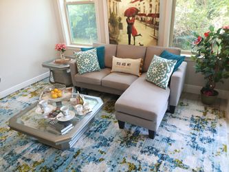 Apartment size Gray L Sectional with tables