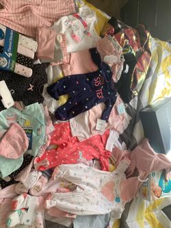 Baby Clothes Papers And Wipes