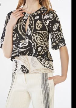 BCBG Maxazria peplum top