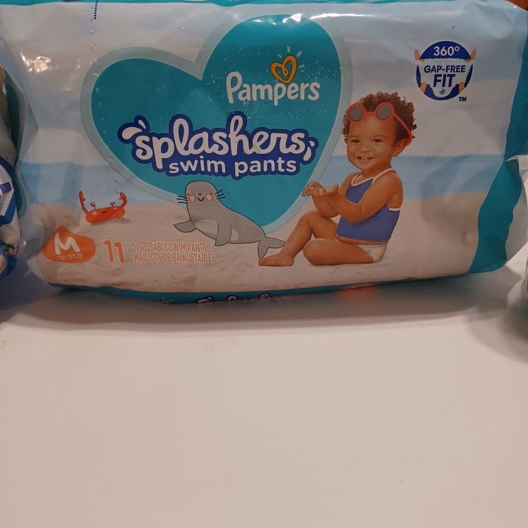 New Baby Pampers swim diapers splashers. Medium
Have multiple packages.
Good for boys and girls
