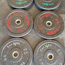 Three Pairs Of Bumper Weights, A Pair Of Fifteens Pair Of 25 And Pair Of Tents