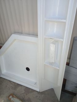New  panels middle section and bottom base brand new I went with tile . $375 for all ! no doors .