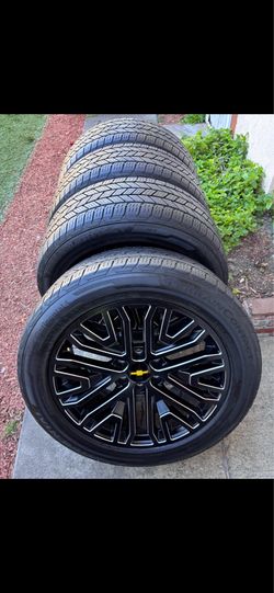 Chevy Silverado stock rims 22 and tires