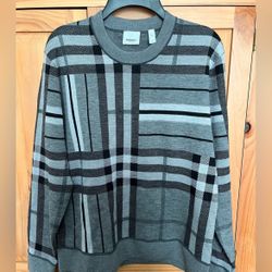 Gray Burberry sweater.