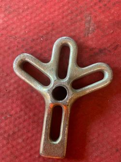 a component from a harmonic balancer puller kit,