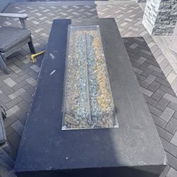 Concrete fire pit with natural gas and propane